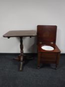 A Victorian mahogany tilt top pedestal table together with a mahogany commode