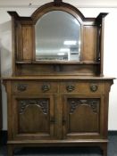 An oak Arts and Crafts mirror back sideboard