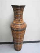 A large contemporary wicker vase