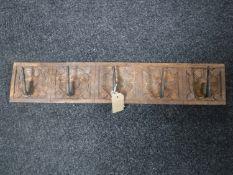 An eastern hardwood five hook coat rack
