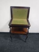 A Victorian mahogany foldover card table