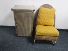 A gold loom bedside cupboard and chair