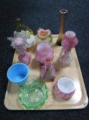 A tray of decorative coloured glass ware
