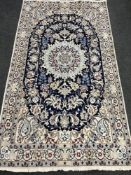 A fringed Persian Nain design rug on cream ground