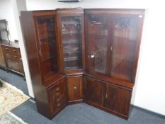 An inlaid mahogany triple section corner bookcase CONDITION REPORT: Looking at the