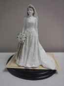 A Coalport figure - The Queen,