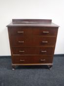 A mahogany four drawer chest