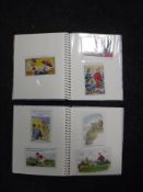 Two albums of humorous British seaside postcards