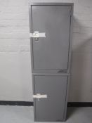 Two metal single door lockers with keys