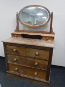 An antique pine dressing chest