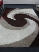 A contemporary swivel pattern shaggy rug