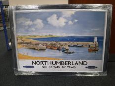 A framed railway advertising picture,