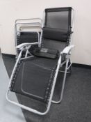 Two folding garden armchairs