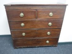 A Victorian inlaid mahogany five drawer chest