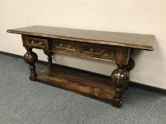 A Barker and Stonehouse three drawer hall table,