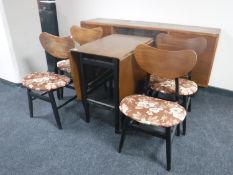 A mid 20th century teak six piece dining room suite