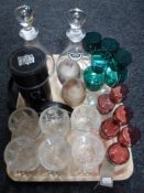 A tray of three Grants Scotch whiskey decanters in leather pouch,