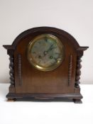 An early 20th century mahogany barley twist column mantel clock