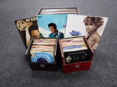 Three cases containing vinyl including albums and 7