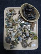A tray of collection of Wade whimsies and a basket of metal animal figures