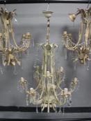 A metal light fitting with glass drops