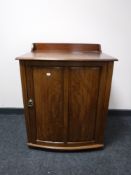A late Victorian mahogany cabinet fitted three drawers