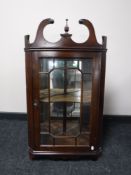 A mahogany corner display cabinet,