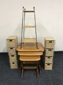 A nest of three teak tables,