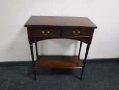 An inlaid side table fitted two drawers