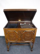 An early 20th century Yagerphone gramophone in oak cabinet,