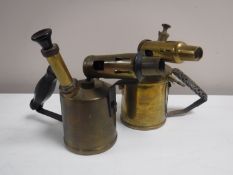 Two vintage brass blow lamps