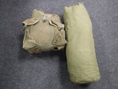 A WWII ruck sack and kit bag containing 20 military shirts