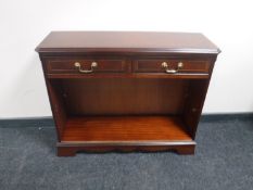A set of inlaid mahogany open shelves