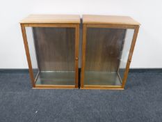 A pair of oak glazed display cabinets