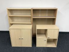 Two sets of open bookshelves,