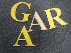 Four antique painted pottery shop letters