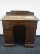 An Edwardian oak clerk's desk