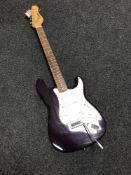 An Encore electric guitar