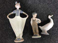 Three Nao figures; Boy with football,