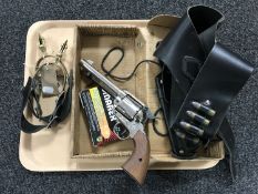 A blank firing revolver with blanks,