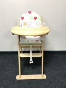 A wooden high chair
