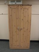 A pine double door wardrobe