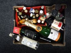 A box of alcohol miniatures, bottle of Drambuie, bottle of sherry,