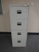 Four drawer metal filing cabinet with key