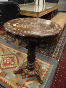 A Chinese inlaid hardwood occasional table on tripod base, height 75 cm.