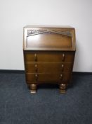 A mid 20th century oak bureau