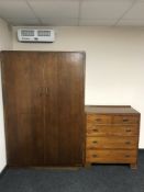 A mid 20th century oak wardrobe and a pine five drawer chest