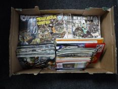 Two boxes containing 1970's and later Newcastle United programmes together with a box of Newcastle