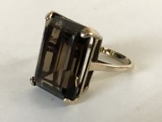 A 9ct gold ring set with a large citrine