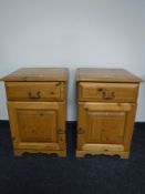 A pair of pine bedside cabinets